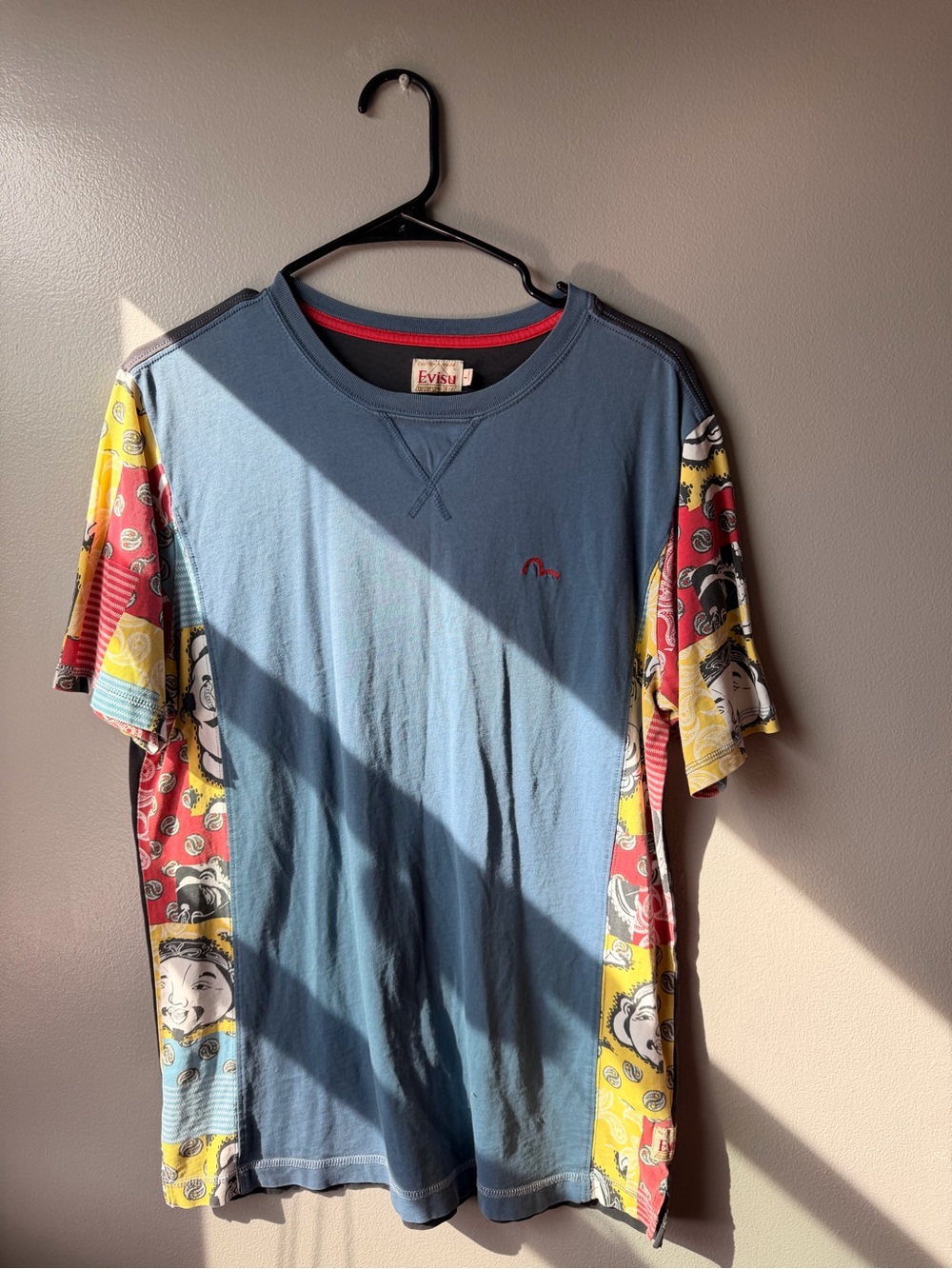 Evisu Blue Tee with Red, Yellow and Black Graphic Side Panels